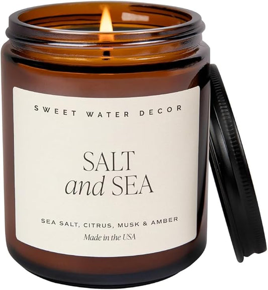 Sweet Water Decor Salt and Sea Soy Candle - Sea Salt, Citrus, Musk, and Amber Scented Beach Candle for Home - 9oz Amber Jar + Black Lid, 40+ Hour Burn Time, Made in The USA