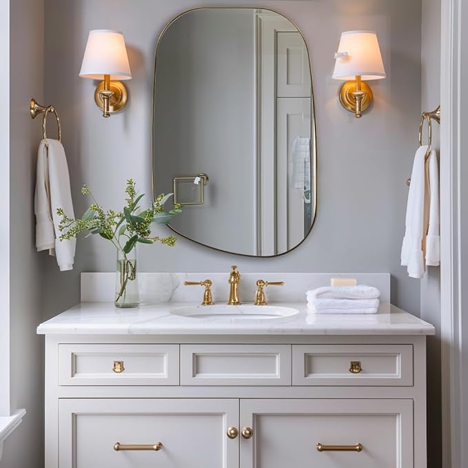 ANDY STAR Gold Bathroom Mirror, 24"x36" Brushed Brass Asymmetrical Wall Mirror in Stainless Steel Metal Frame, Unique Vanity Mirror with Modern Curved Design, Ideal for Bathroom, Bedroom, Entryway