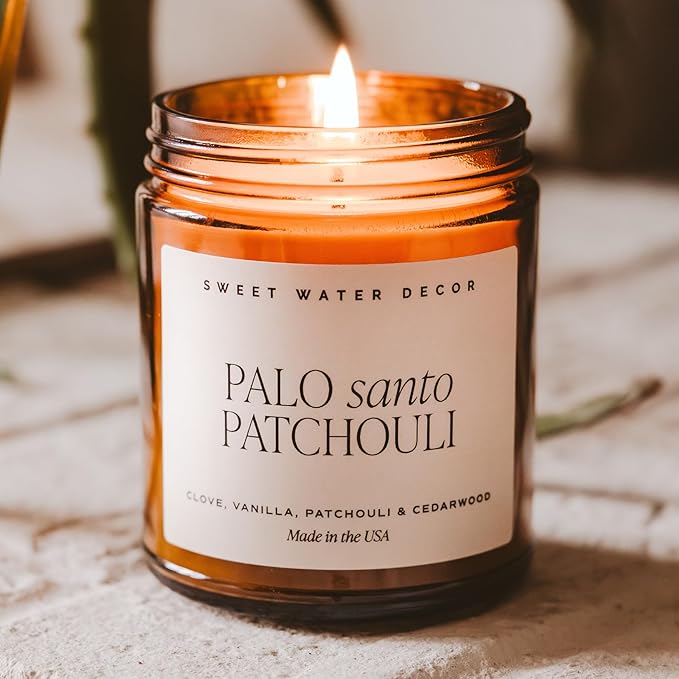 Sweet Water Decor Palo Santo Patchouli Soy Candle - Black Pepper, Clove Leaf, Nutmeg and Lavender Scented Candles for Home - 9oz Amber Jar + Black Lid, 40+ Hour Burn Time, Made in The USA