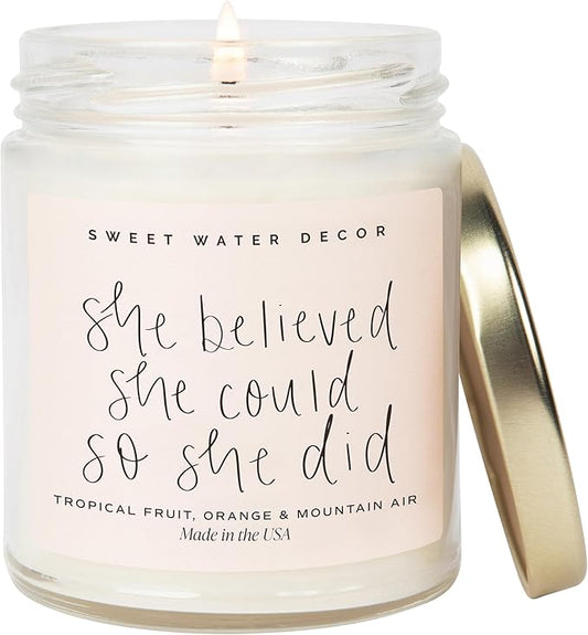 Sweet Water Decor, She Believed She Could So She Did, Tropical Fruit, Orange, Mountain Air, and Island Scented Soy Wax Candle for Home | 9oz Clear Jar, 40 Hour Burn Time, Made in The USA